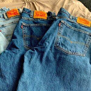 (3) pair Levi’s 550 38x32. Sold as a Lot Barely worn. Lighter pair has some wear